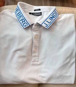J Lindeberg Golf Shirt with blue logo on collar