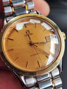 omega speedmaster gold watch