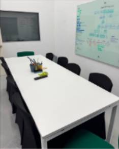 White Meeting Table with 8 Black Chairs