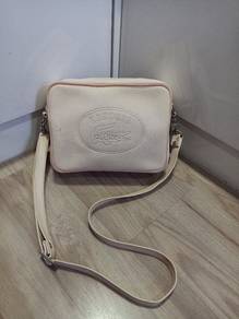 Original Lacoste sling bag