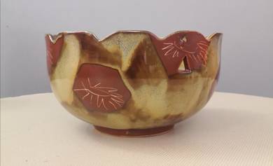 Pottery hanging bowl red brown