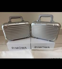 rimowa sling bag aluminium