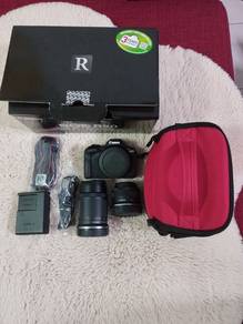 Canon eos r50 with 18-55 mm lens + 55-210 mm lens