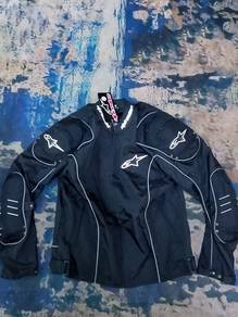 baju ride alpinestars