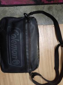 coleman sling bag 