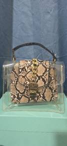Some PVC and Snake skin looking bag