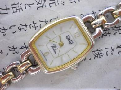 Vintage Japan Q and Q lady watch
