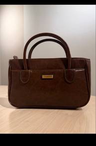 Rosetti hand carry bag/clutch