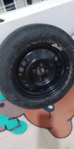 tak pernah pakai lagi...tayar spare kereta almiera