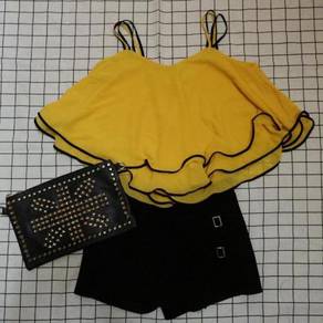 Yellow sleeveless top party