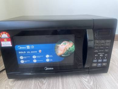 Selling a Midea SOLO 25L 800W Microwave Oven.