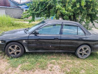 Proton Wira GL in Raja Uda, PNG