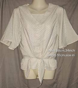 White polka dot tie-front cropped top