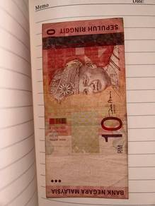 Duit lama RM10 (zeti aziz)