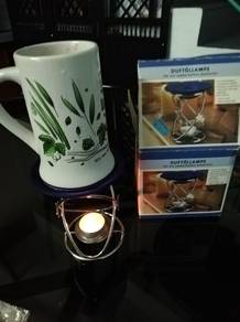 2 in one place (Candle) and coffee warmer. Germany