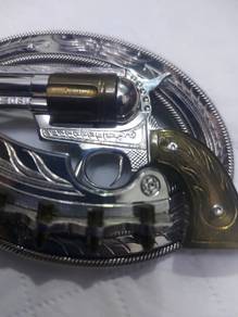 Vintage revolver belt buckle