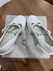 Charles & Keith white patent mary jane shoes