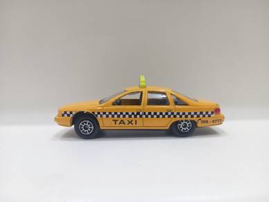Welly Chevrolet Caprice Taxi Cab Diecast Car