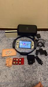 Nintendo Switch OLED White with 9 Games