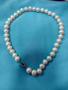 White Pearl necklace with silver clasps 