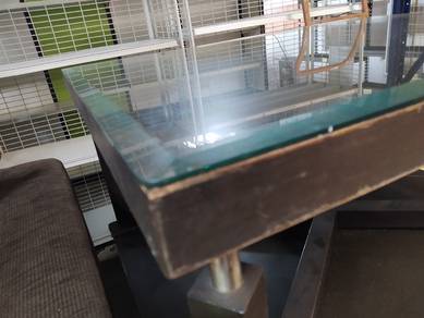 Used fair Square coffee table with a glass top
