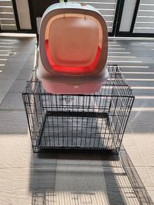 cat cage and litter box