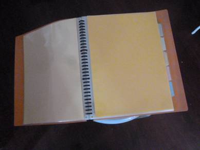 A4 orange file + with several 30 holes pockets