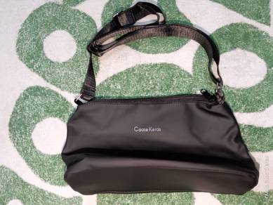 Sling bag caate kerds