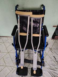 kerusi roda dan tongkat budak