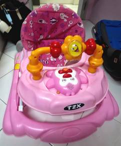 BABY WALKER FOR SALE withmusic free extra chairtoy