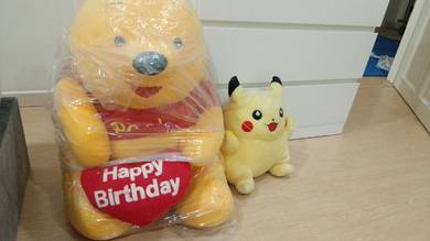 fat and big plush toy pooh bear and pikachu