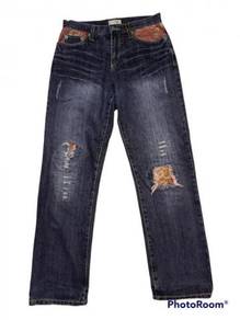 Ripped and patch jeans