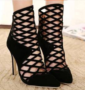 Black pointed high party heels shoe holes