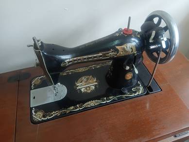 Singer Sewing Machine To Let Go