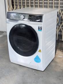 Electrolux 2in1 front load hot washer dryer 11/7`k