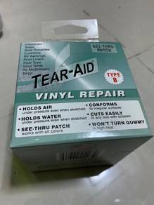 Tear-aid (vinyl and fabric repair)