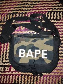 A Bathing Ape (BAPE) "1st Camo" Shoulder Bag.