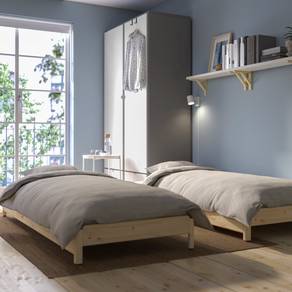 Two IKEA singles size beds with mattresses 