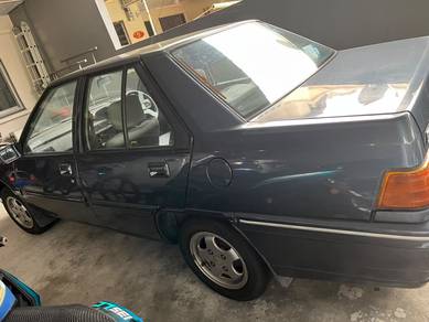 Proton Iswara S in Tanjung Bungah, PNG