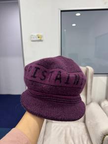 purple knitted news boy cap with brim