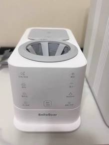 Milk bottle warmer
