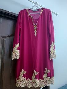 baju kurung merah