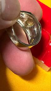 cincin besi kuning dua alam