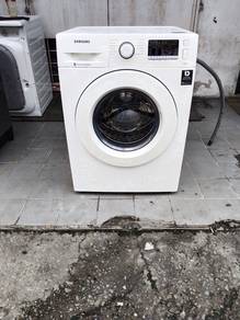Samsung front load hot washer washing machine 7.k