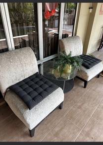 2 chairs and glass round table