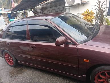 Proton Wira A/B GLi in Batu Ferringhi, PNG