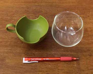 vintage retro Pyrex glass cup with plastic holder