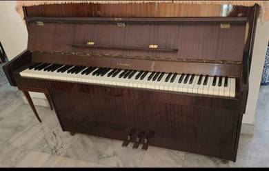 Upright Piano Used.