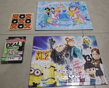 Puzzles, Monopoly Deal, Tic Tac Toe board game