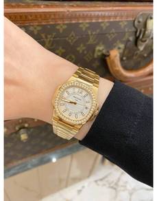 Patek Philippe Nautilus 18K Rose Gold Factory Diam